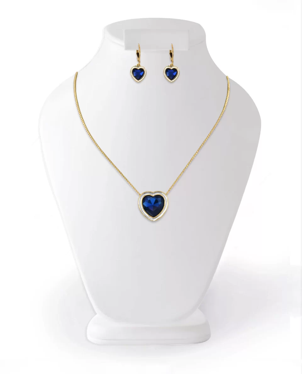 Set de collar + aretes decorado con dije en forma de corazón y piedra en tono azul montana.